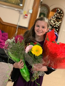 Tessa with flowers after LCO performance.